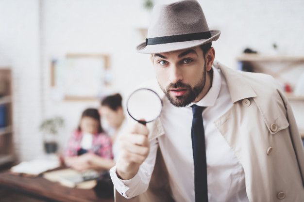 man-is-posing-with-magnifying-glass_94347-746