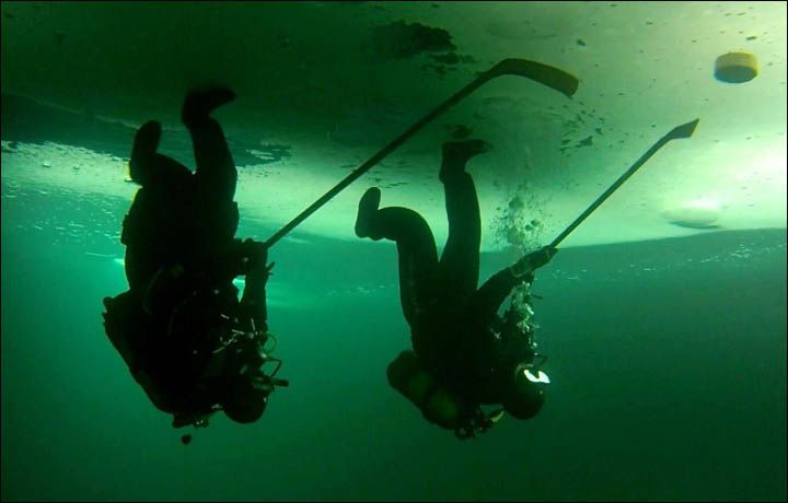 Underwater ice hockey